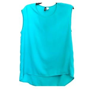 Teal cut off tank